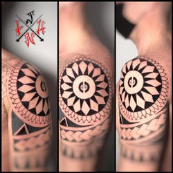 Polynesian-sun-tattoo.jpg